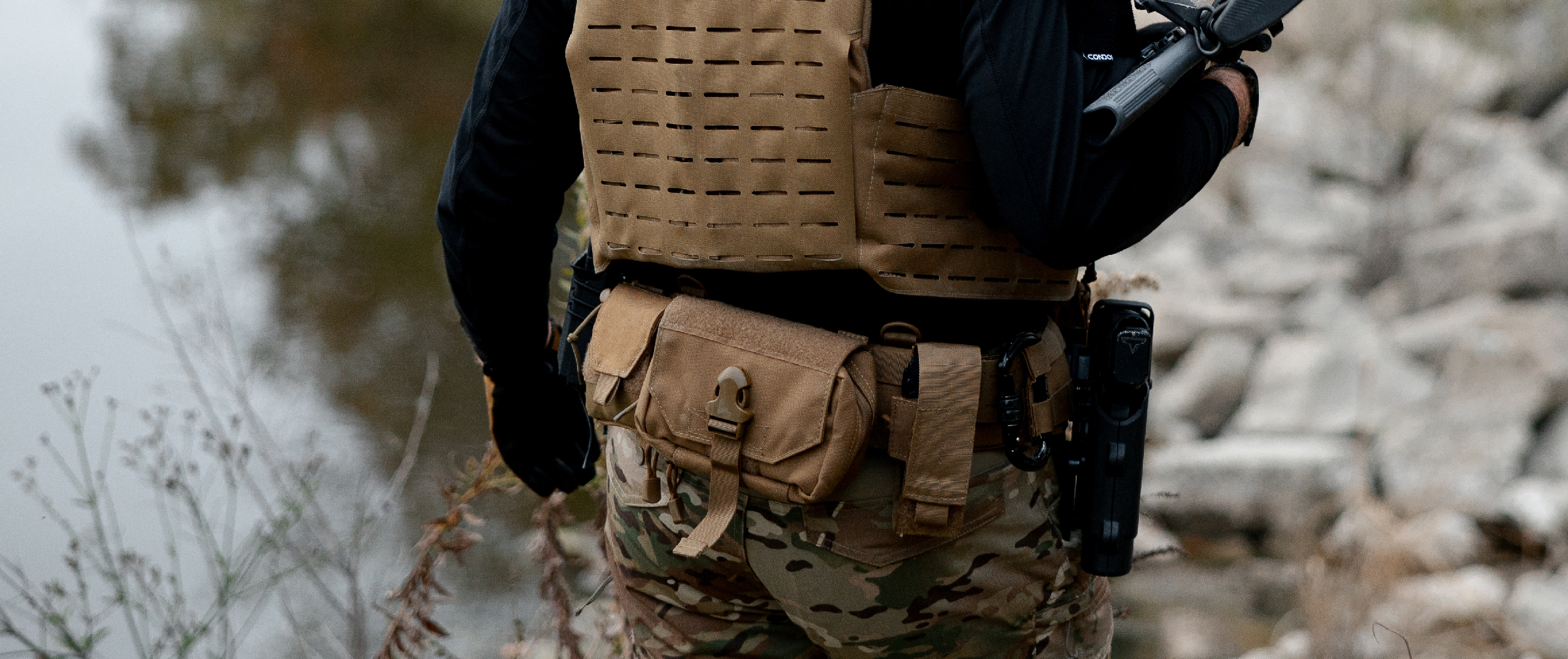 Image of the first response medical pouch attached to the back of a battle belt