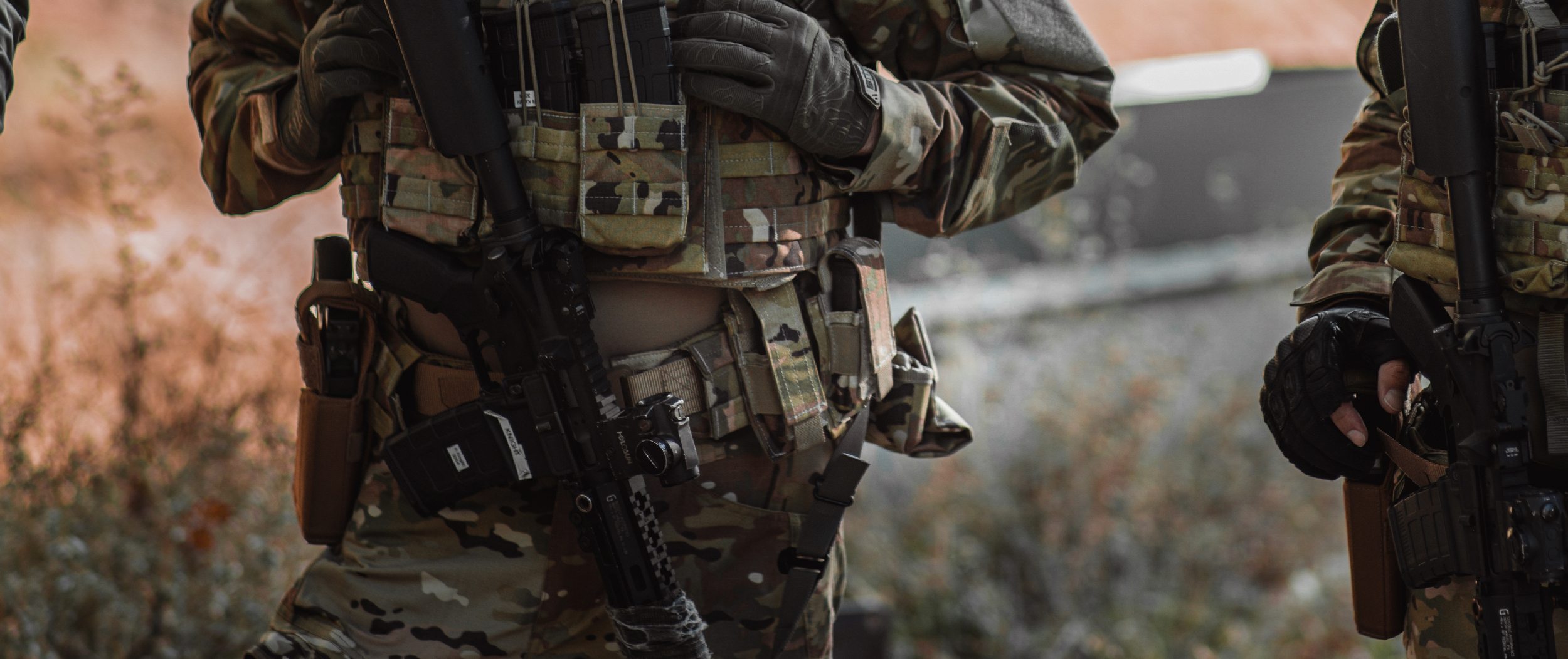 Image of a single pistol pouch in multicam