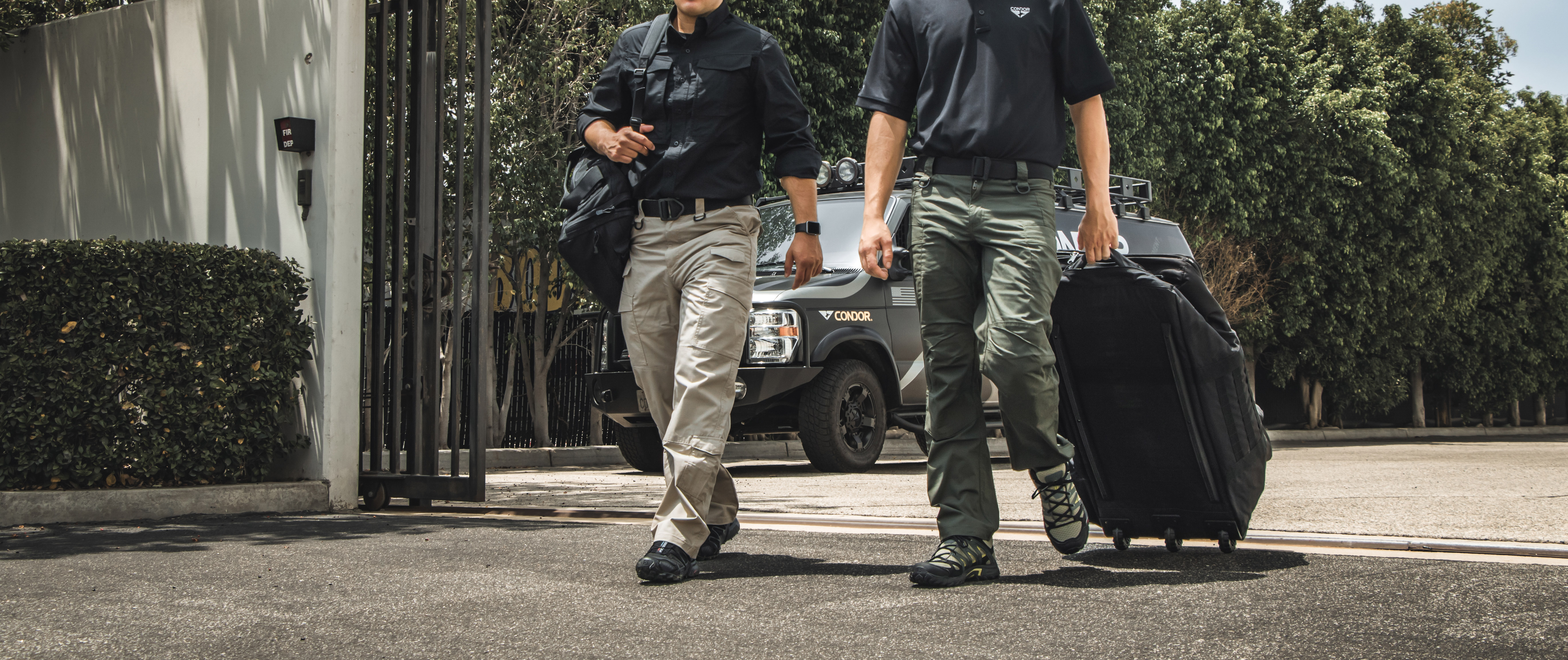 photo of two people walking in a parking lot wearing sentinel tactical pants