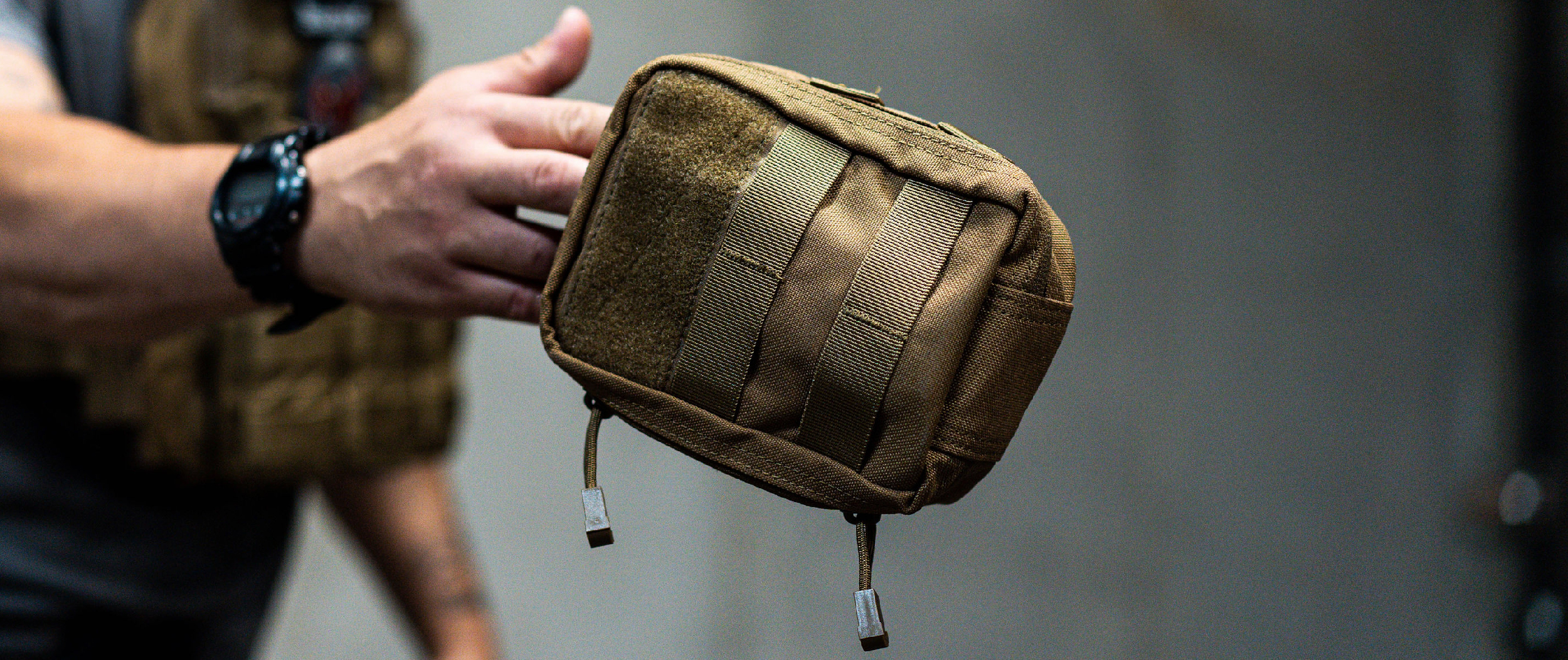 Image of the rip-away pouch having been torn off the base and getting passed