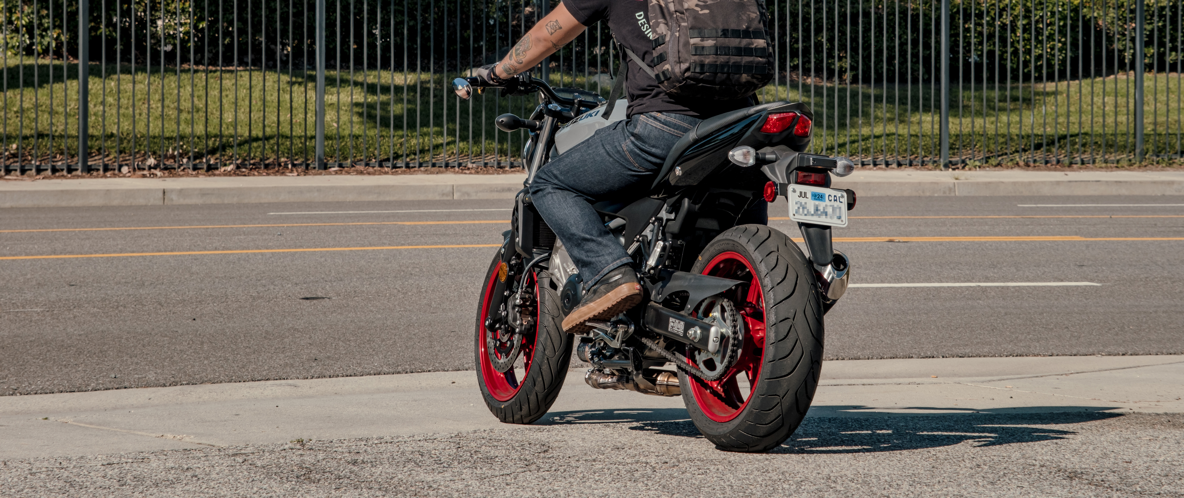 Image of a person on a motorcycle in Cipher Jeans