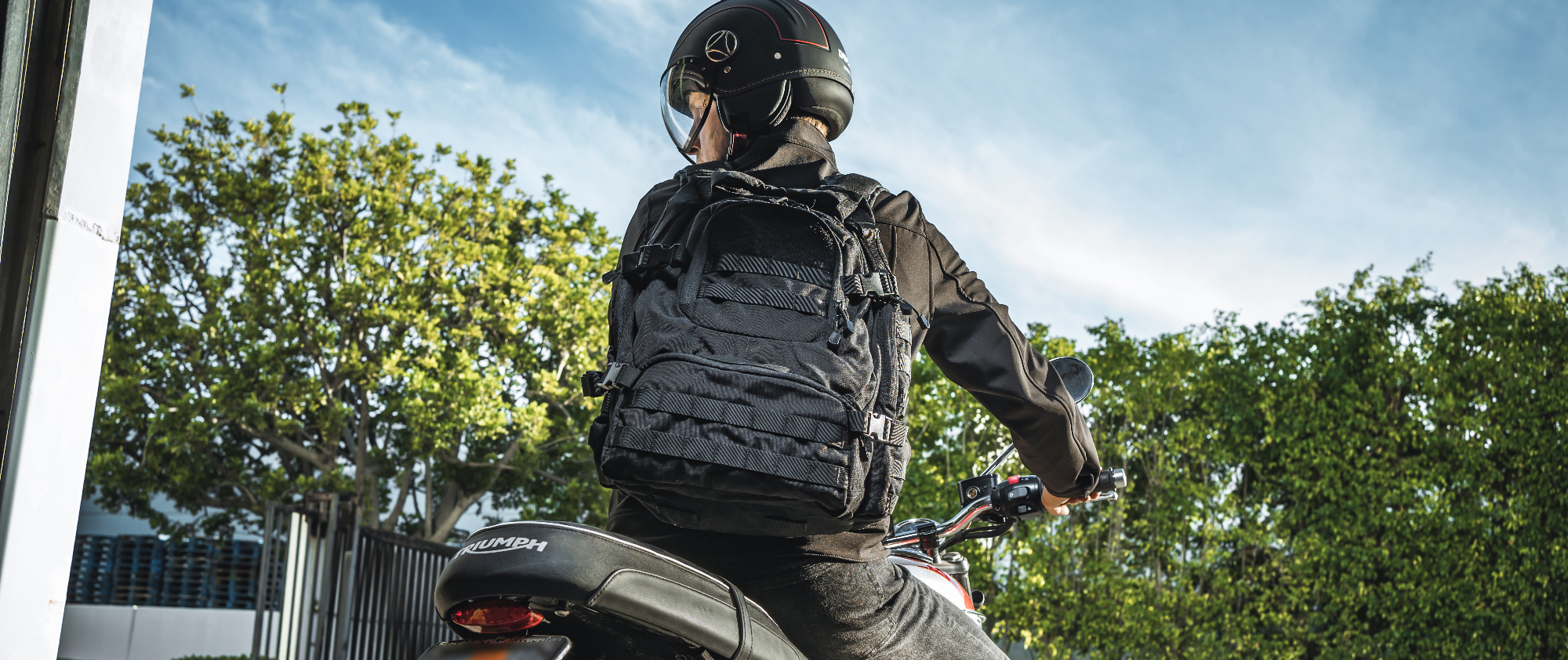 Image of the backpack where someone is on amotorcycle