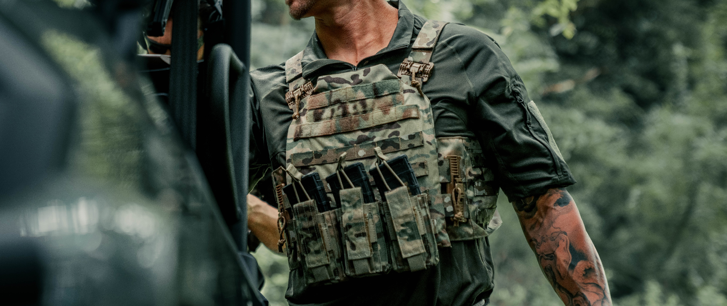 Image of someone in a multicam cyclone rs plate carrier