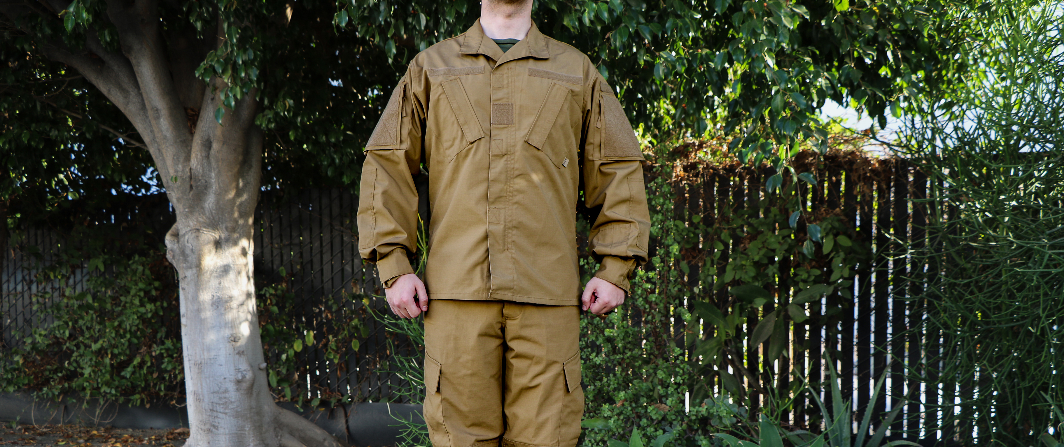 image of a cadet in the cadet coat standing at attention