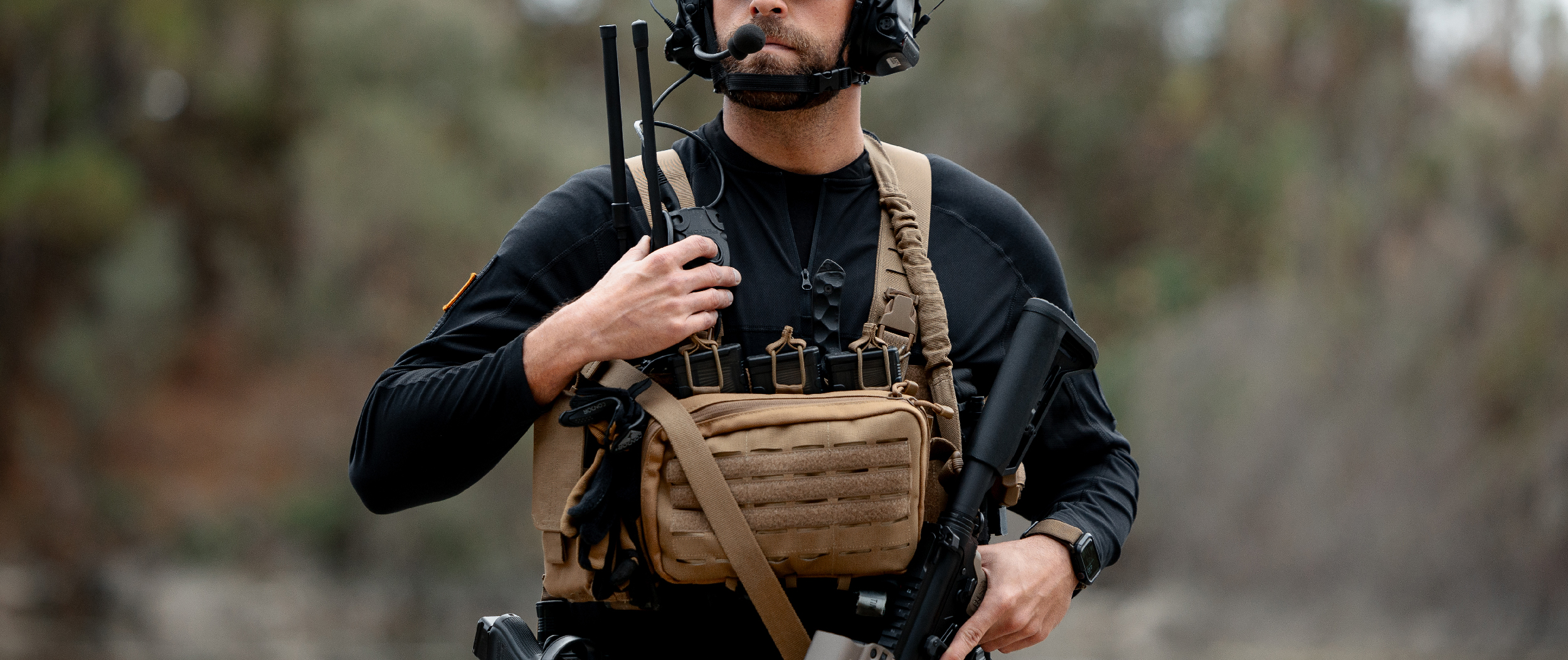 Image of an operator wearing a fully built out lcs harness