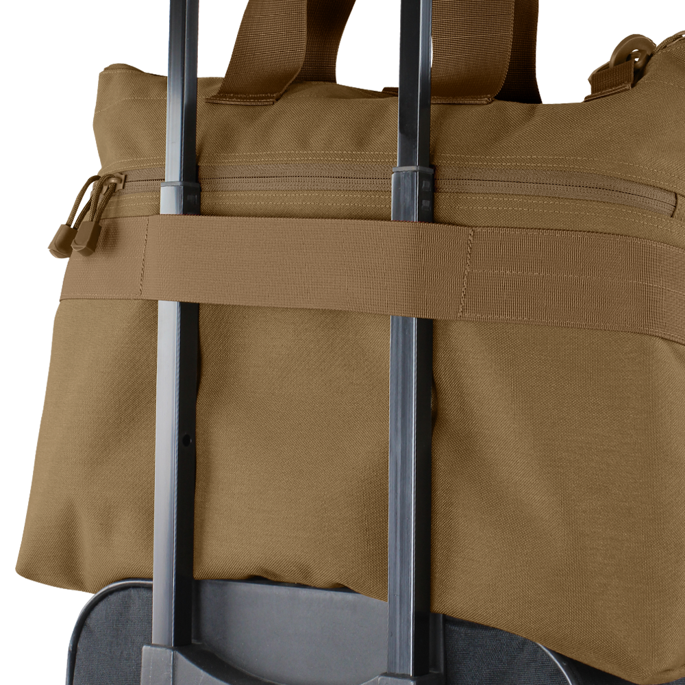 Image of the bag's ability to be carried by a luggage strap