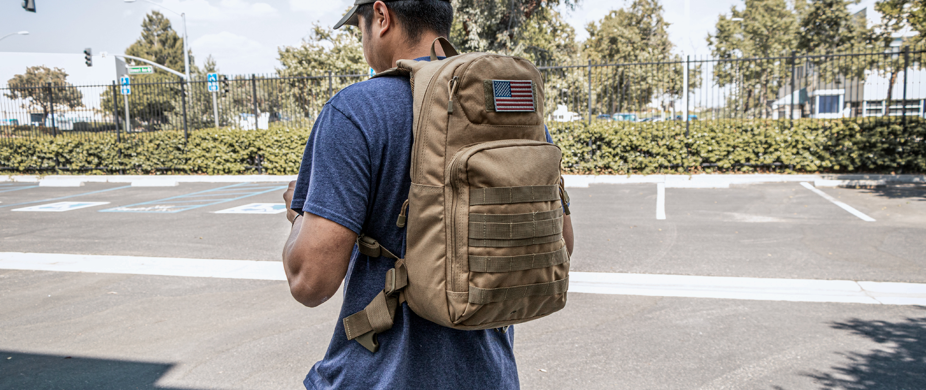 Image of someone in a parking lot wearing the fuel hydration pack